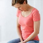 What role does posture play in managing urinary discomfort?